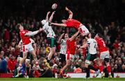22 February 2025; Mack Hansen of Ireland and Jac Morgan of Wales, left, contest a high ball during the Guinness Six Nations Rugby Championship match between Wales and Ireland at the Principality Stadium in Cardiff, Wales. Photo by Ben McShane/Sportsfile