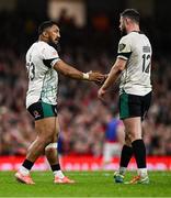 22 February 2025; Bundee Aki, left, and Robbie Henshaw of Ireland celebrate after their side win a penalty during the Guinness Six Nations Rugby Championship match between Wales and Ireland at the Principality Stadium in Cardiff, Wales. Photo by Seb Daly/Sportsfile