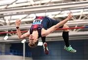 22 February 2025; Ciaran Connolly of Le Chéile AC, Kildare, on his way to winning the men's high jump during day one of the 123.ie National Senior Indoor Championships at the National Indoor Arena on the Sport Ireland Campus in Dublin. Photo by Sam Barnes/Sportsfile