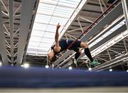 22 February 2025; Ciaran Connolly of Le Chéile AC, Kildare, on his way to winning the men's high jump during day one of the 123.ie National Senior Indoor Championships at the National Indoor Arena on the Sport Ireland Campus in Dublin. Photo by Sam Barnes/Sportsfile