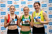 22 February 2025; Women's 200m medallists, Katie Bergin of Moyne AC, Tipperary, gold, centre, Kate O'Connell of Lucan Harriers AC, Dublin, silver, left, and Molly Hourihan of UCD AC, Dublin, bronze, right, during day one of the 123.ie National Senior Indoor Championships at the National Indoor Arena on the Sport Ireland Campus in Dublin. Photo by Sam Barnes/Sportsfile