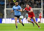 22 February 2025; Niall Scully of Dublin in action against Conor Doherty of Derry during the Allianz Football League Division 1 match between Dublin and Derry at Croke Park in Dublin. Photo by Daire Brennan/Sportsfile