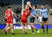 22 February 2025; Alex Gavin of Dublin in action against Conor Doherty of Derry during the Allianz Football League Division 1 match between Dublin and Derry at Croke Park in Dublin. Photo by Piaras Ó Mídheach/Sportsfile