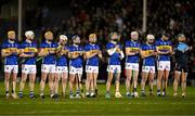 22 February 2025; Tipperary players give a round of applause during a minute silence in memory of the late jockey Michael O'Sullivan before the Allianz Hurling League Division 1A match between Tipperary and Cork at FBD Semple Stadium in Thurles, Tipperary. Photo by Brendan Moran/Sportsfile