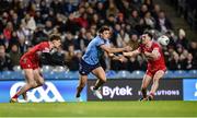 22 February 2025; Eoghan O'Donnell of Dublin in action against Eoin McEvoy, left, and Diarmuid Baker of Derry during the Allianz Football League Division 1 match between Dublin and Derry at Croke Park in Dublin. Photo by Peter Langan/Sportsfile