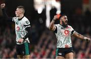 22 February 2025; Ireland players Bundee Aki, right, and Sam Prendergast celebrate during the Guinness Six Nations Rugby Championship match between Wales and Ireland at the Principality Stadium in Cardiff, Wales. Photo by Seb Daly/Sportsfile