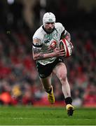 22 February 2025; Mack Hansen of Ireland during the Guinness Six Nations Rugby Championship match between Wales and Ireland at the Principality Stadium in Cardiff, Wales. Photo by Ben McShane/Sportsfile