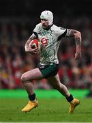 22 February 2025; Mack Hansen of Ireland during the Guinness Six Nations Rugby Championship match between Wales and Ireland at the Principality Stadium in Cardiff, Wales. Photo by Ben McShane/Sportsfile