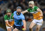 22 February 2025; John Hetherton of Dublin in action against David King, left, and DJ McLoughlin of Offaly during the Allianz Hurling League Division 1B match between Dublin and Offaly at Croke Park in Dublin. Photo by Piaras Ó Mídheach/Sportsfile