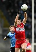 22 February 2025; Conor Doherty of Derry in action against Cian Murphy of Dublin during the Allianz Football League Division 1 match between Dublin and Derry at Croke Park in Dublin. Photo by Daire Brennan/Sportsfile