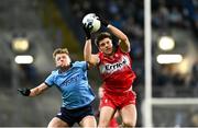 22 February 2025; Conor Doherty of Derry in action against Cian Murphy of Dublin during the Allianz Football League Division 1 match between Dublin and Derry at Croke Park in Dublin. Photo by Daire Brennan/Sportsfile