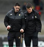 23 February 2025; Clare selector Brendan Bugler, left, and John Conlon before the Allianz Hurling League Division 1A match between Clare and Wexford at Cusack Park in Ennis, Clare. Photo by Brendan Moran/Sportsfile