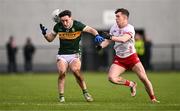 23 February 2025; Paudie Clifford of Kerry in action against Eoin McElholm of Tyrone during the Allianz Football League Division 1 match between Tyrone and Kerry at Pomeroy Plunkett's GAA Club in Pomeroy, Tyrone. Photo by Ramsey Cardy/Sportsfile