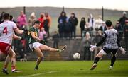23 February 2025; David Clifford of Kerry scores his side's first goal past Tyrone goalkeeper Niall Morgan during the Allianz Football League Division 1 match between Tyrone and Kerry at Pomeroy Plunkett's GAA Club in Pomeroy, Tyrone. Photo by Ramsey Cardy/Sportsfile