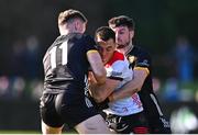 23 February 2025; Andy McDonnell of Louth in action against Odhran Murdock, left, and James Guinness of Down during the Allianz Football League Division 2 match between Louth and Down at Integral GAA Grounds in Drogheda, Louth. Photo by Tyler Miller/Sportsfile