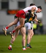 23 February 2025; Jason Foley of Kerry carries Darragh Canavan of Tyrone during the Allianz Football League Division 1 match between Tyrone and Kerry at Pomeroy Plunkett's GAA Club in Pomeroy, Tyrone. Photo by Ramsey Cardy/Sportsfile