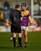 23 February 2025; Cian Byrne of Wexford pleads with referee Thomas Gleeson before being shown a red card during the Allianz Hurling League Division 1A match between Clare and Wexford at Cusack Park in Ennis, Clare. Photo by Brendan Moran/Sportsfile
