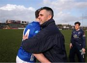 23 February 2025; Gearoid McKiernan of Cavan is congratulated by manager Raymond Galligan during the Allianz Football League Division 2 match between Westmeath and Cavan at TEG Cusack Park in Mullingar, Westmeath. Photo by Michael P Ryan/Sportsfile