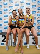 23 February 2025; Women's 400m medallists, Sharlene Mawdsley of Newport AC, Tipperary, gold, centre, Phil Healy of Bandon AC, Cork, silver, left, and Rachel McCann of North Down AC, bronze, right, during day two of the 123.ie National Senior Indoor Championships at the National Indoor Arena on the Sport Ireland Campus in Dublin. Photo by Sam Barnes/Sportsfile
