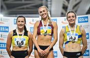 23 February 2025; Women's 400m medallists, Sharlene Mawdsley of Newport AC, Tipperary, gold, centre, Phil Healy of Bandon AC, Cork, silver, left, and Rachel McCann of North Down AC, bronze, right, during day two of the 123.ie National Senior Indoor Championships at the National Indoor Arena on the Sport Ireland Campus in Dublin. Photo by Sam Barnes/Sportsfile