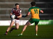 23 February 2025; Dylan McHugh of Galway in action against Dáire Ó Baoill of Donegal during the Allianz Football League Division 1 match between Galway and Donegal at Pearse Stadium in Galway. Photo by Piaras Ó Mídheach/Sportsfile