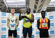 23 February 2025; Men's 60m medallists, Bori Akinola of UCD AC, Dublin, gold, centre, Max O'Reilly of Riverstick/Kinsale AC, Cork, silver, left, and Israel Olatunde of Tallaght AC, Dublin, bronze, right, during day two of the 123.ie National Senior Indoor Championships at the National Indoor Arena on the Sport Ireland Campus in Dublin. Photo by Sam Barnes/Sportsfile