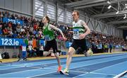 23 February 2025; Sean Tobin of Clonmel AC, Tipperary, right, dips for the line to win the men's 3000m final ahead of James Gormley of Carmen Runners, who finished second, during day two of the 123.ie National Senior Indoor Championships at the National Indoor Arena on the Sport Ireland Campus in Dublin. Photo by Sam Barnes/Sportsfile