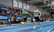 23 February 2025; Sean Tobin of Clonmel AC, Tipperary, right, dips for the line to win the men's 3000m final ahead of James Gormley of Carmen Runners, who finished second, during day two of the 123.ie National Senior Indoor Championships at the National Indoor Arena on the Sport Ireland Campus in Dublin. Photo by Sam Barnes/Sportsfile