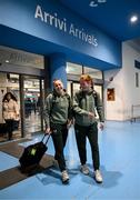 23 February 2025; Lucy Quinn, left, and Emily Murphy on arrival at Trieste Airport in Italy before travelling onto Slovenia for their UEFA Women's Nations League League B match against Slovenia on Tuesday. Photo by Stephen McCarthy/Sportsfile