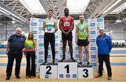 22 February 2025; Athletics Ireland president John Cronin, far left, and President of the Irish Schools Athletic Association Billy Delaney, far right, with men's triple jump medallists, David Onwudiwe of Ennis Track AC, Clare, gold, centre, Colm Bourke of Raheny Shamrock AC, Dublin, silver, left, and Denis Finnegan of An Ríocht AC, Kerry, bronze, right, during day one of the 123.ie National Senior Indoor Championships at the National Indoor Arena on the Sport Ireland Campus in Dublin. Photo by Sam Barnes/Sportsfile