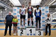 22 February 2025; Athletics Ireland President John Cronin, far left, and Athletics Northern Ireland President Wendy Phillips, far right, with men's high jump medallists, Ciaran Connolly of Le Chéile AC, Kildare, gold, centre, Lorcan Murphy of Dundrum South Dublin AC, silver, left, and Emmanuel Osas of Ratoath AC, Meath, bronze, right, during day one of the 123.ie National Senior Indoor Championships at the National Indoor Arena on the Sport Ireland Campus in Dublin. Photo by Sam Barnes/Sportsfile
