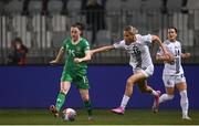 25 February 2025; Lucy Quinn of Republic of Ireland in action against Kaja Eržen of Slovenia during the UEFA Women's Nations League B match between Slovenia and Republic of Ireland at Bonifika Stadium in Koper, Slovenia. Photo by Stephen McCarthy/Sportsfile