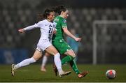 25 February 2025; Lucy Quinn of Republic of Ireland in action against Korina Janez of Slovenia during the UEFA Women's Nations League B match between Slovenia and Republic of Ireland at Bonifika Stadium in Koper, Slovenia. Photo by Stephen McCarthy/Sportsfile