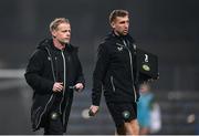 25 February 2025; Republic of Ireland assistant head coach Alan Mahon and performance analyst Jackson Huxley, right, during the UEFA Women's Nations League B match between Slovenia and Republic of Ireland at Bonifika Stadium in Koper, Slovenia. Photo by Stephen McCarthy/Sportsfile