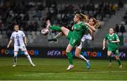 25 February 2025; Amber Barrett of Republic of Ireland in action against Lana Golob of Slovenia during the UEFA Women's Nations League B match between Slovenia and Republic of Ireland at Bonifika Stadium in Koper, Slovenia. Photo by Stephen McCarthy/Sportsfile