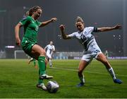 25 February 2025; Kyra Carusa of Republic of Ireland in action against Dominika Conc of Slovenia during the UEFA Women's Nations League B match between Slovenia and Republic of Ireland at Bonifika Stadium in Koper, Slovenia. Photo by Stephen McCarthy/Sportsfile