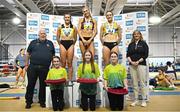 23 February 2025; Athletics Ireland President John Cronin, far left, and Sport Ireland Chief Executive Dr Una May, far right, with women's 400m medallists, Sharlene Mawdsley of Newport AC, Tipperary, gold, centre, Phil Healy of Bandon AC, Cork, silver, centre left, and Rachel McCann of North Down AC, bronze, centre right, during day two of the 123.ie National Senior Indoor Championships at the National Indoor Arena on the Sport Ireland Campus in Dublin. Photo by Sam Barnes/Sportsfile