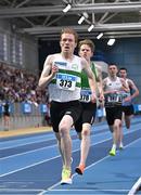 23 February 2025; Sean Tobin of Clonmel AC, Tipperary, on his way to winning the men's 3000m during day two of the 123.ie National Senior Indoor Championships at the National Indoor Arena on the Sport Ireland Campus in Dublin. Photo by Sam Barnes/Sportsfile