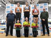 23 February 2025; Athletics Ireland President John Cronin, far left, and Sport Ireland Director of Governing Bodies and High Performance Paul McDermott, far right, with women's long jump medallists, Lauren Callaghan of Finn Valley AC, Donegal, gold, centre, Laura Frawley of Nenagh Olympic AC, Tipperary, silver, centre left, and Anna McCauley of City of Lisburn AC, Down, centre right, bronze, during day two of the 123.ie National Senior Indoor Championships at the National Indoor Arena on the Sport Ireland Campus in Dublin. Photo by Sam Barnes/Sportsfile