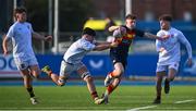 26 February 2025; Corey O'Brien of Temple Carrig School is tackled by Billy O'Reilly-Rodes, left, and James Brandon of Presentation College, Bray during the Bank of Ireland Leinster Rugby Boys Schools Vinnie Murray Cup final match between Temple Carrig School and Presentation College, Bray at Energia Park in Dublin. Photo by Shauna Clinton/Sportsfile