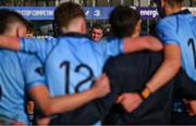 27 February 2025; St Michael's College players, including captain Herbie Boyle, centre, huddle after their side's victory in the Bank of Ireland Leinster Rugby Boys Schools Junior Cup second round match between St Michael's College and Belvedere College at Energia Park in Dublin. Photo by Shauna Clinton/Sportsfile