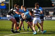 27 February 2025; Sam Dunne of St Michael's College is tackled by Belvedere College players Elliot Scanlan, left, and Conor Stafford during the Bank of Ireland Leinster Rugby Boys Schools Junior Cup second round match between St Michael's College and Belvedere College at Energia Park in Dublin. Photo by Shauna Clinton/Sportsfile