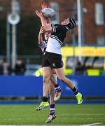 27 February 2025; Donal Larkin of Newbridge College contests a high ball against Ryan Mahon of Clongowes Wood College during the Bank of Ireland Leinster Rugby Boys Schools Junior Cup second round match between Clongowes Wood College and Newbridge College at Energia Park in Dublin. Photo by Shauna Clinton/Sportsfile