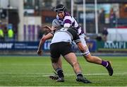 27 February 2025; Lucas Aveling of Clongowes Wood College in action against Saul Brewster of Newbridge College during the Bank of Ireland Leinster Rugby Boys Schools Junior Cup second round match between Clongowes Wood College and Newbridge College at Energia Park in Dublin. Photo by Shauna Clinton/Sportsfile