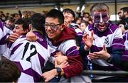 27 February 2025; Clongowes Wood College supporters celebrate with players after their side's victory in the Bank of Ireland Leinster Rugby Boys Schools Junior Cup second round match between Clongowes Wood College and Newbridge College at Energia Park in Dublin. Photo by Shauna Clinton/Sportsfile