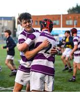 27 February 2025; Ifeanyi Emmanuel of Clongowes Wood College, left, celebrates with team-mate Shaun Priede after their side's victory in the Bank of Ireland Leinster Rugby Boys Schools Junior Cup second round match between Clongowes Wood College and Newbridge College at Energia Park in Dublin. Photo by Shauna Clinton/Sportsfile