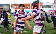 27 February 2025; Ifeanyi Emmanuel of Clongowes Wood College, left, celebrates with team-mate Shaun Priede after their side's victory in the Bank of Ireland Leinster Rugby Boys Schools Junior Cup second round match between Clongowes Wood College and Newbridge College at Energia Park in Dublin. Photo by Shauna Clinton/Sportsfile