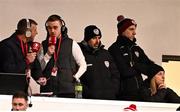 28 February 2025; Suspended Derry City manager Tiernan Lynch, second from right, in attendance during the SSE Airtricity Men's Premier Division match between Derry City and Waterford at The Ryan McBride Brandywell Stadium in Derry. Photo by Ben McShane/Sportsfile