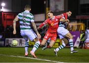 28 February 2025; Sean Boyd of Shelbourne is tackled by Roberto Lopes of Shamrock Rovers during the SSE Airtricity Men's Premier Division match between Shelbourne and Shamrock Rovers at Tolka Park in Dublin. Photo by Stephen McCarthy/Sportsfile