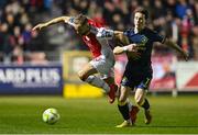 28 February 2025; Ryan McLaughlin of St Patrick's Athletic in action against Will Fitzgerald of Sligo Rovers during the SSE Airtricity Men's Premier Division match between St Patrick's Athletic and Sligo Rovers at Richmond Park in Dublin. Photo by Piaras Ó Mídheach/Sportsfile